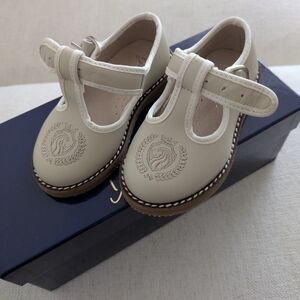 Cream T-Strap Leather Dress Shoes with Embroidered Crest
